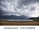 Monsoon incoming on the Parambikulam reservoir, India.