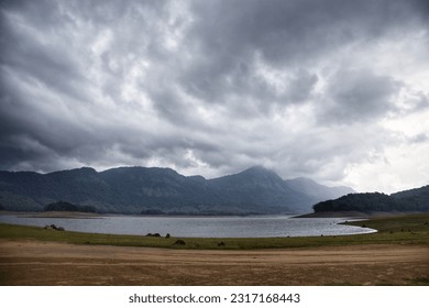 Monsoon incoming on the Parambikulam reservoir, India. - Shutterstock ID 2317168443