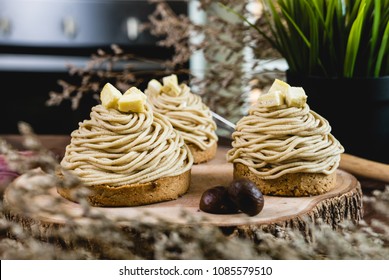 Mont Blanc Dessert or Chestnut Cream cake a dessert filled mostly with whipped cream. set on wooden table - Powered by Shutterstock