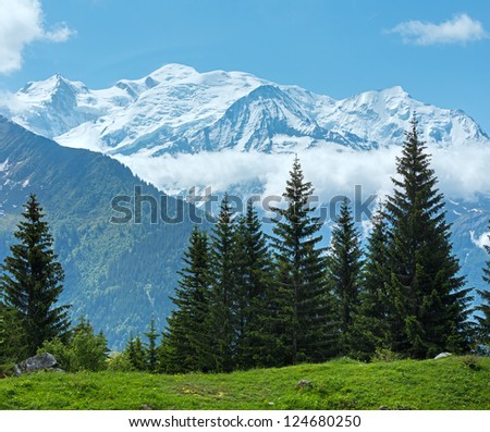 Mont Blanc mountain massif (Chamonix valley, France, view from Plaine Joux outskirts). Beautiful natural vacation hiking walking travel to nature alps destinations concept.