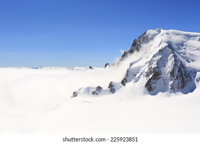 Mont Blanc Mountain Peak Above Low Clouds