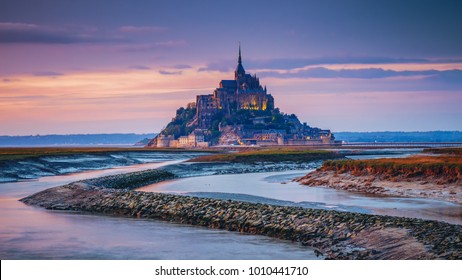 Mont Saint-Michel view in the sunset light. Normandy, northern France - Powered by Shutterstock