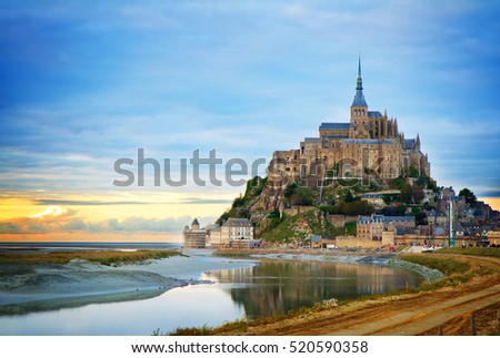 Mont St Michel city at sunset, Brittany France, toned