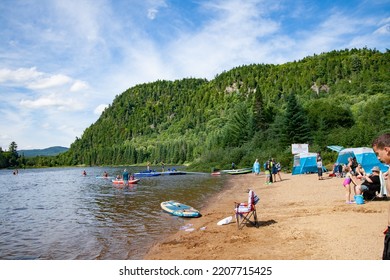 Mont Tremblant, Quebec,Canada, 07-03-2022 Quiet Beach In A Beautiful National Park In Perfect Coexistence With Nature, Enjoying The Summer And The Sun