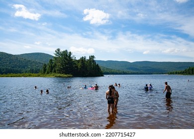 Mont Tremblant, Quebec,Canada, 07-03-2022 Quiet Beach In A Beautiful National Park In Perfect Coexistence With Nature, Enjoying The Summer And The Sun