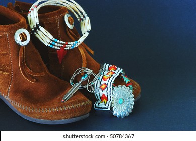 Montage Of Native American Moccasins And Handcrafted Jewelry Made From Silver, Turquoise,beads, Antlers,horns, And Coral.