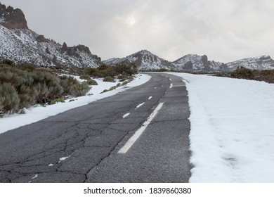 Montain Road With Snow On The Roadside