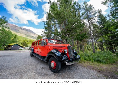 montana, AUG 25: Historical red travel car in front of the Swiftcurrent Motor Inn on AUG 25, 2019 at Montana