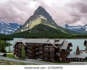 Montana Mountain And Lake With A Chalet Style Hotel