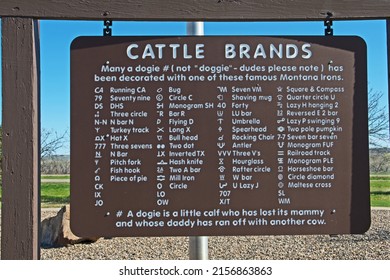 Montana, USA - May 14 2022: An Informational Sign Lists Famous Historic Cattle Brands In Use In Montana Along With Other Useful Information.