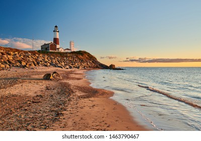 Montauk Lighthouse And Beach At Sunrise, Long Island, New York, USA. 