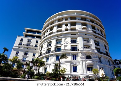 Monte Carlo, Monaco - September 2021: The Iconic Circular Tower Of The Belle Epoque Hotel De Paris Overlooking The Harbor In Monte Carlo Has Become A Landmark On The French Riviera. 