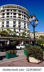 Monte Carlo, Monaco - September 2021: The Iconic Circular Tower Of The Belle Epoque Hotel De Paris Overlooking The Harbor In Monte Carlo Has Become A Landmark On The French Riviera. 