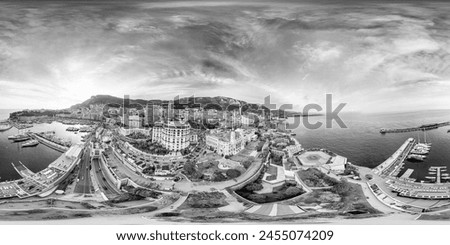 Similar – On the left, part of Gaeta Cathedral (Italy) On the right, an old building and the silhouette of an umbrella line. In between the view of the old town and the port of Gaeta.