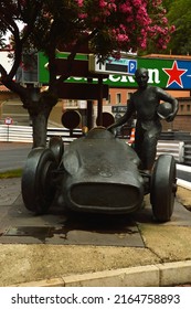 Montecarlo Giugno 3 2022
Bronze Statue Of Juan Manuel Fangio Standing Next To His Grand Prix Mercedes Car