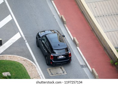 Monte-Carlo, Monaco - October 5 2018 : Aerial View Of A Beautiful Black MINI Cooper S Countryman ALL4 (Top View) Driving On The Boulevard Du Larvotto In Monaco, French Riviera