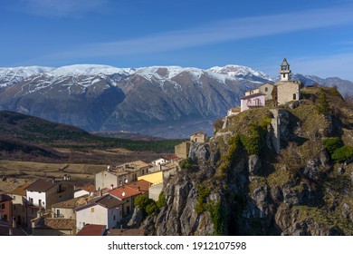 Montenerodomo in Abruzzo, Italy. It is a medieval town on top of the hill. Blue sky. Maiella Mountain in background.