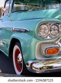 Monterey, California, USA - August 18, 2022: Monterey Car Week 2022, A Mint Green Classic Truck, Chevrolet Apache With Red And Chrome Rims And White Wall Tires