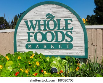 MONTEREY, CA/USA - APRIL 10, 2014:  Whole Food Market Exterior Sign.  Whole Foods Is An American Foods Supermarket Chain Specializing In Natural And Organic Foods.