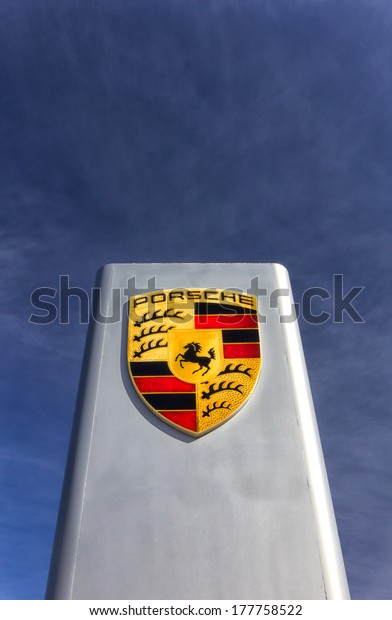 MONTEREY, CA/USA\
- FEBRUARY 17, 2014: Porsche automobile dealership sign. Porsche\
Auomobil Holding is a German holding company with investments in\
the automotive\
industry.
