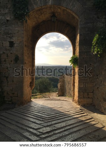 Monteriggioni, Italy - August 2015 - ancient door