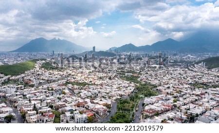 Monterrey city in Nuevo León. Beautiful drone view on San Pedro Garza García and famous landmark Cerro de la Silla mountain.