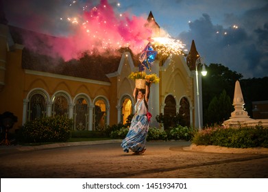 Monterrey, Mexico. June 27, 2019.  Woman Dancer From Oaxaca Makes And Exhibition Of A Traditional Dance That Includes A Basket With Fireworks.