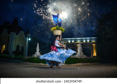 Monterrey, Mexico. June 27, 2019.  Woman Dancer From Oaxaca Makes And Exhibition Of A Traditional Dance That Includes A Basket With Fireworks.