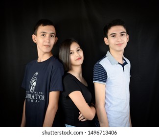 Monterrey Nuevo Leon, Mexico. August 23, 2019. Teenage Triplets Portrait  Photography Session. One Girl And Two Boys