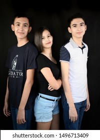 Monterrey Nuevo Leon, Mexico. August 23, 2019. Teenage triplets portrait  photography session. One girl and two boys