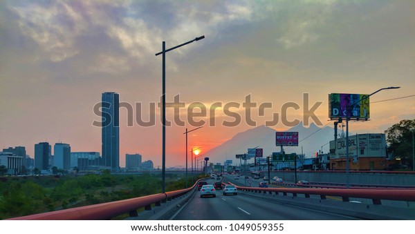 Monterrey, Nuevo Leon,\
Mexico - February 28, 2018: Driving through the city of Monterrey,\
Mexico at Sunrise.\
