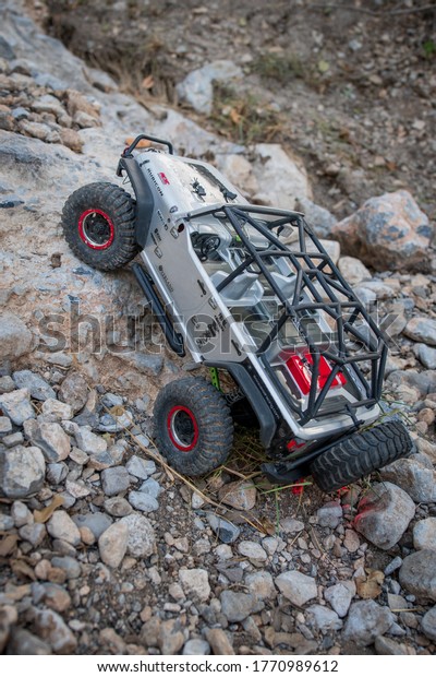 Monterrey Nuevo Leon,\
Mexico. July 6, 2020. All terrain vehicle  is rock crawling in a\
difficult road.