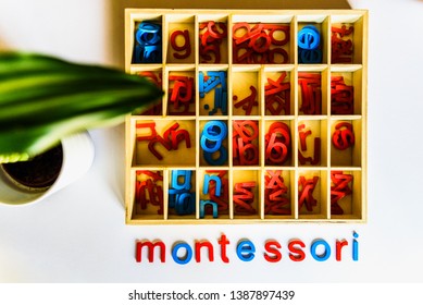 Montessori Method Is An Educational Model, Word Written With Wooden Letters.