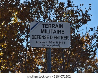 Montferrat, Provence-Alpes-Cote D'Azur, France - 11-05-2021: Warning Sign At Restricted Area Near Camp De Canjuers, Military Training Ground Of The French Army, In Provence, France With Tree.