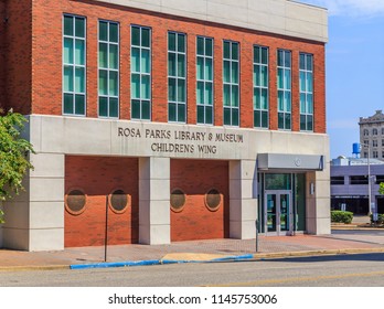 MONTGOMERY, ALABAMA - JULY 29, 2018:  Rosa Parks Library and Museum: 
 Front facade of Rosa Parks Library and Museum Children`s Wing located in downtown Montgomery, Alabama with a blue sky backdrop.