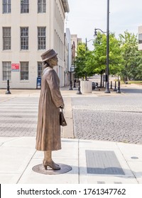 MONTGOMERY, ALABAMA - JUNE,21, 2020: Rosa Parks Statue Overlooks Black Lives Matter Mural: Statue of Parks symbolically overlooks Black Lives Matter mural at court square fountain in Montgomery.