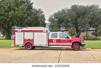 MONTGOMERY, ALABAMA - SEPTEMBER 28, 2018:  Air Force Emergency Response Fire Vehicles:  Air Force Emergency Response Fire Vehicles Parallel Parked On A Military Base.