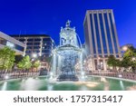 Montgomery, Alabama, USA fountain and downtown cityscape at twilight.