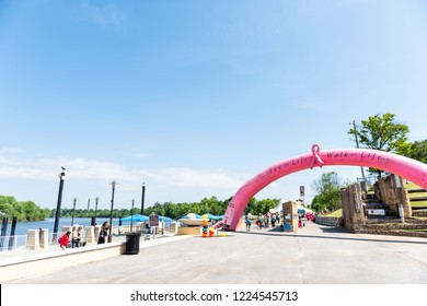 Montgomery, USA - April 21, 2018: Alabama Capital City During Sunny Day With Walk Joy Of Life Pink Ribbon Breast Cancer Fundraiser, People, Arch In Riverfront Park