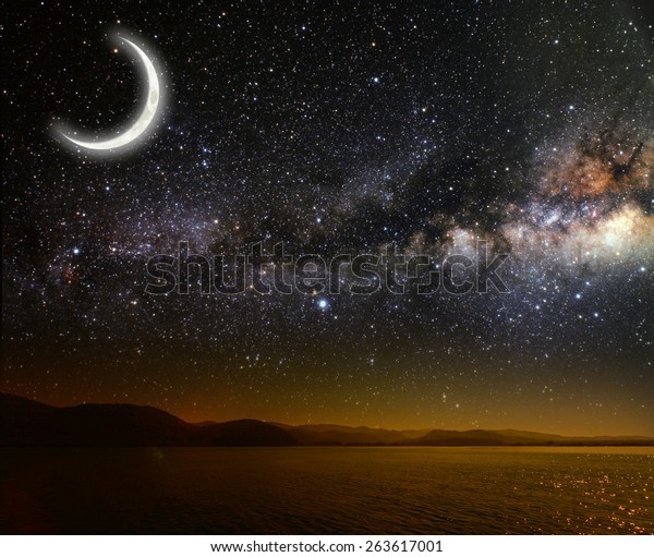 month on a background star sky\
reflected in the sea. Elements of this image furnished by\
NASA