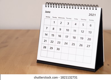 Month Page: June In 2021 Paper Calendar On The Wooden Table