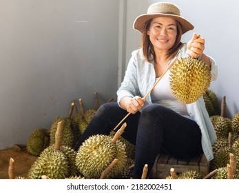 Monthong Durian In The Hands Of The Seller At The Market