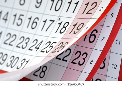 Months and dates shown on a calendar whilst turning the pages