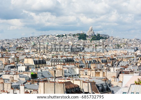 Montmartre - Sacre coeur and paris roof aerial view