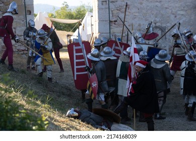 MONTORIO, VERONA, ITALY, 2022: MEDIEVAL FESTIVAL AT THE CASTLE: Medieval Soldier Attack Simulation