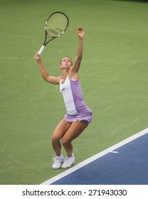 MONTREAL - AUGUST 5: Camila Giorgi of Italy in her Second round match against Elena Vesnina of Russia at the 2014 Rogers Cup on August 5, 2014 in Montreal, Canada