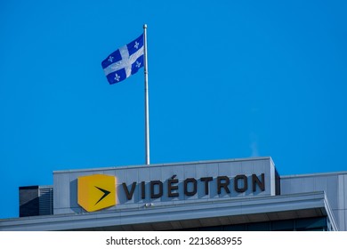 Montreal, CA - 11 October 2022: Videotron Sign And Quebec Flag