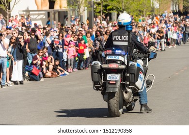 Montreal, CA - 20 May 2017: Police Officer On Motorbike During Royal De Luxe Show