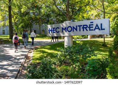 Montreal, CA - 5 September 2019: Students Passing By HEC Montreal Sign