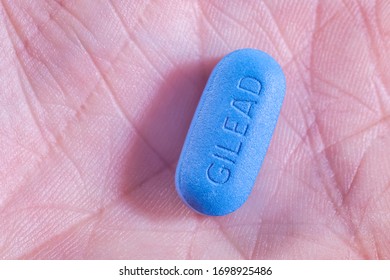 Montreal, CA - 8 October 2015: Gilead Truvada Blue Pill In A Hand